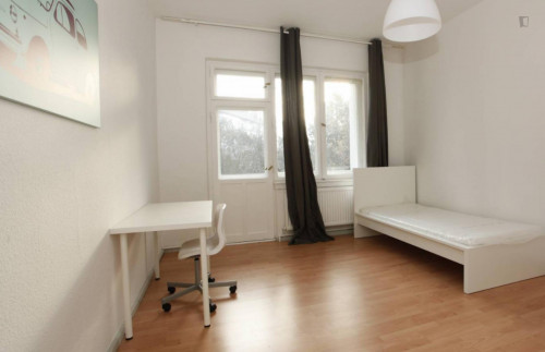 Harmonious room with enclosed balcony in 2-bedroom apartment in Neukölln