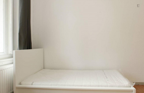 Harmonious room with enclosed balcony in 2-bedroom apartment in Neukölln