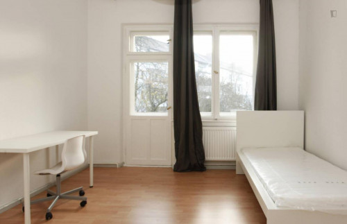 Harmonious room with enclosed balcony in 2-bedroom apartment in Neukölln