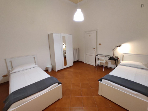 Bed in a comfy twin bedroom, in Acquabella - Gallery - 2