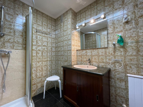 Breezy double ensuite bedroom with a balcony, near the Matiko train station