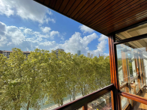 Breezy double ensuite bedroom with a balcony, near the Matiko train station