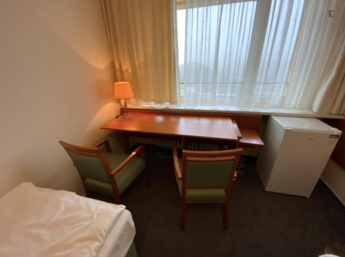 Bed in an ensuite twin bedroom, in a hotel near Přírodní park Košíře-Motol - Gallery - 6