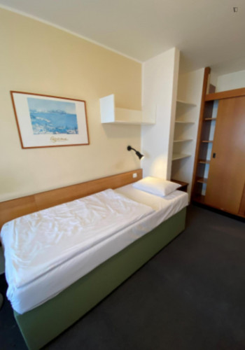Bed in an ensuite twin bedroom, in a hotel near Přírodní park Košíře-Motol - Gallery - 12