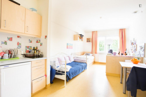 Bed in a twin bedroom, part of a flat in a residence in Liesing