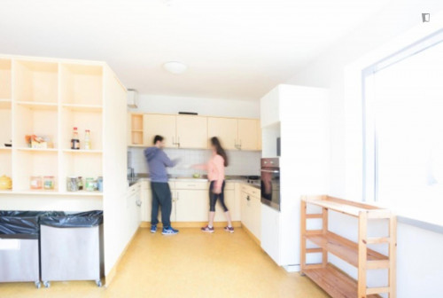Bed in a twin bedroom, in a residence in Penzing