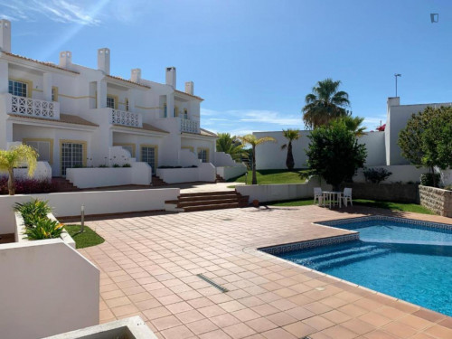Homely 1-bedroom duplex house with swimming pool access in Albufeira