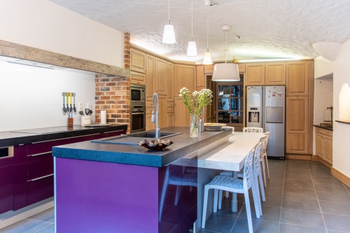 Vibrant Co-living Castle with Sunny Outdoor Spaces, Workspaces, and Terrace for Social Gatherings