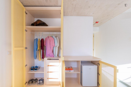 Sunny mezzanine double ensuite bedroom near the The Catholic University of Portugal