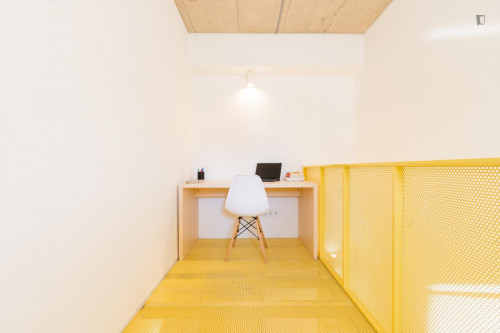 Sunny mezzanine double ensuite bedroom near the The Catholic University of Portugal