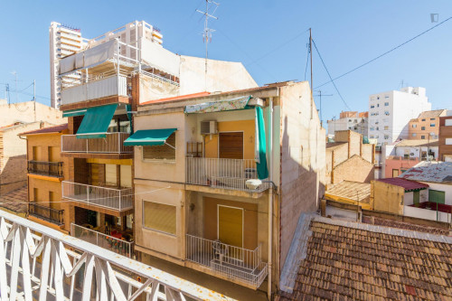 Double bedroom with a balcony in a 5-bedroom flat in Campoamor