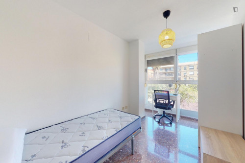 Attractive single ensuite bedroom in a property with balcony