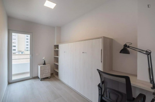 Appealing single bedroom with balcony