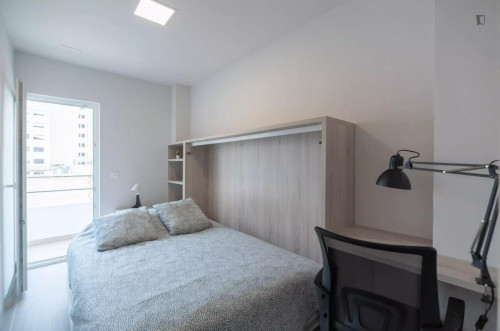 Appealing single bedroom with balcony