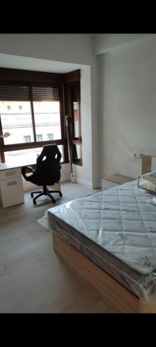 Attractive single bedroom in a property with balcony