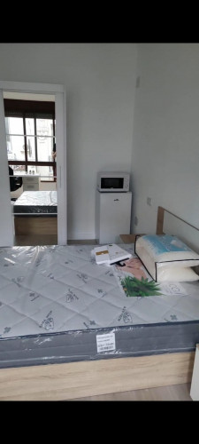 Great looking single bedroom in a property with balcony