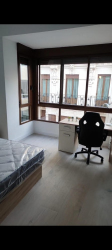 Great looking single bedroom in a property with balcony