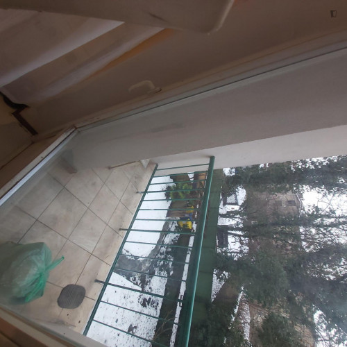 bedroom with a balcony - Gallery - 4
