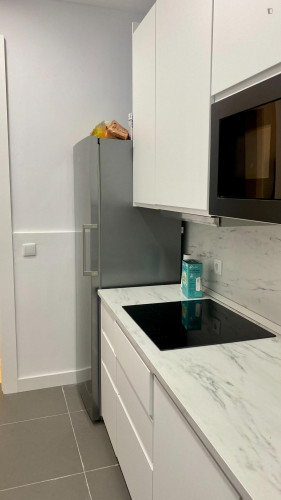 Sunny double bedroom next to Arroios metro station