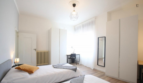 Bed in a twin bedroom near Parco Giardino Ducale Estense