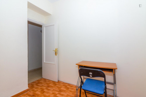 Humble single bedroom with a sunny balcony, in Campoamor
