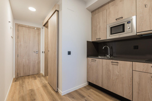 Bed in a twin bedroom with kitchen near Doctor Morales Park - Gallery - 23