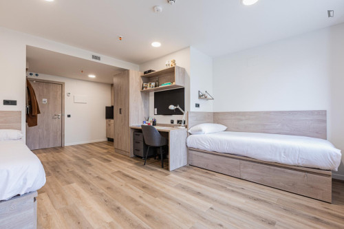 Bed in a twin bedroom with kitchen near Doctor Morales Park - Gallery - 40