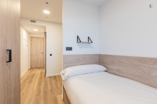 Bed in a twin bedroom with kitchen near Doctor Morales Park - Gallery - 18