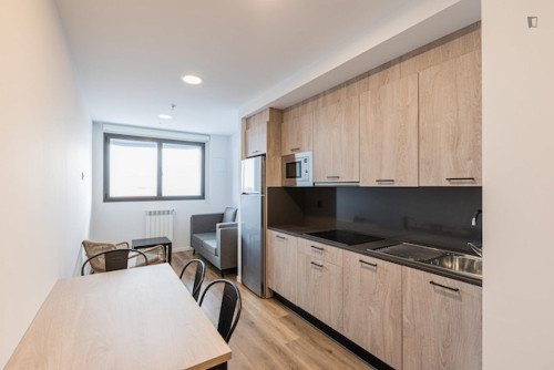 Bed in a twin bedroom with kitchen near Doctor Morales Park