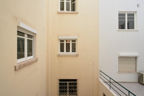 Bed in twin bedroom next to the Atrium Saldanha