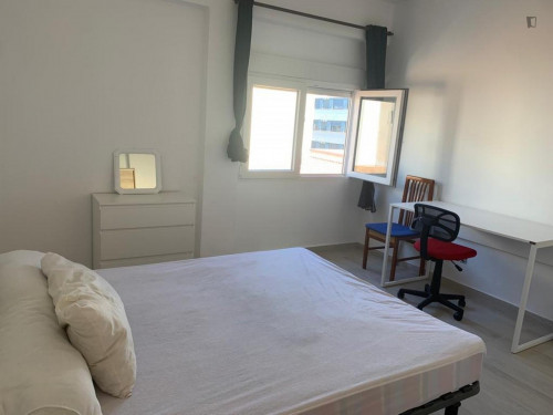 Cozy single bedroom in a property with balcony