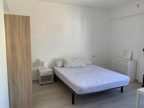 Cozy single bedroom in a property with balcony