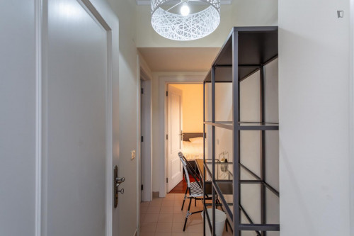 Cozy single bedroom with balcony