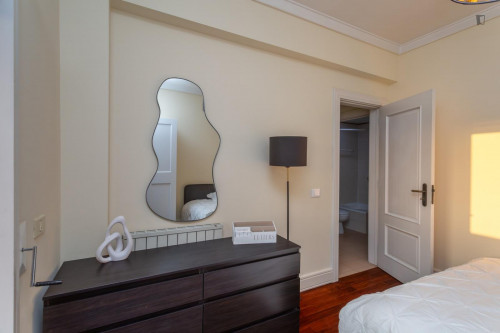 Cozy single bedroom with balcony