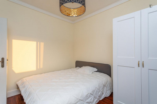 Cozy single bedroom with balcony