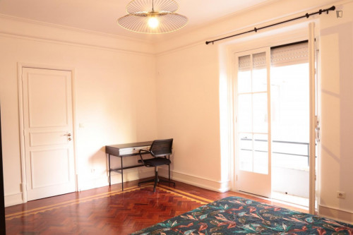 Cozy single bedroom with balcony