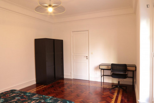 Cozy single bedroom with balcony