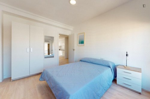 Cozy single bedroom with balcony