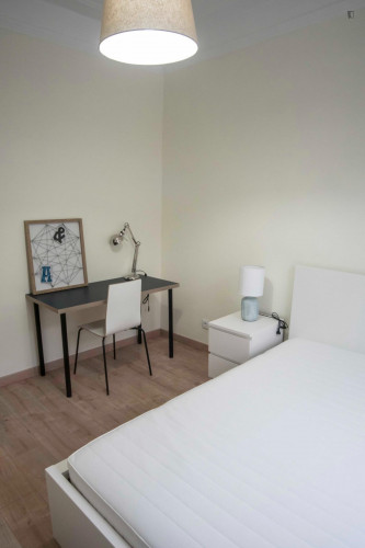 Cozy single bedroom with balcony