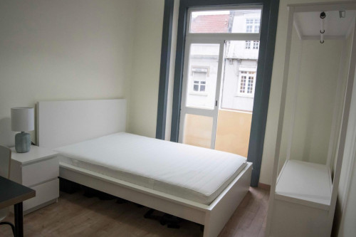 Cozy single bedroom with balcony