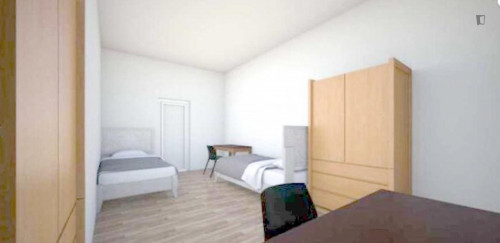 Bed in a cool twin ensuite bedroom, near Università di Management ed Economia
