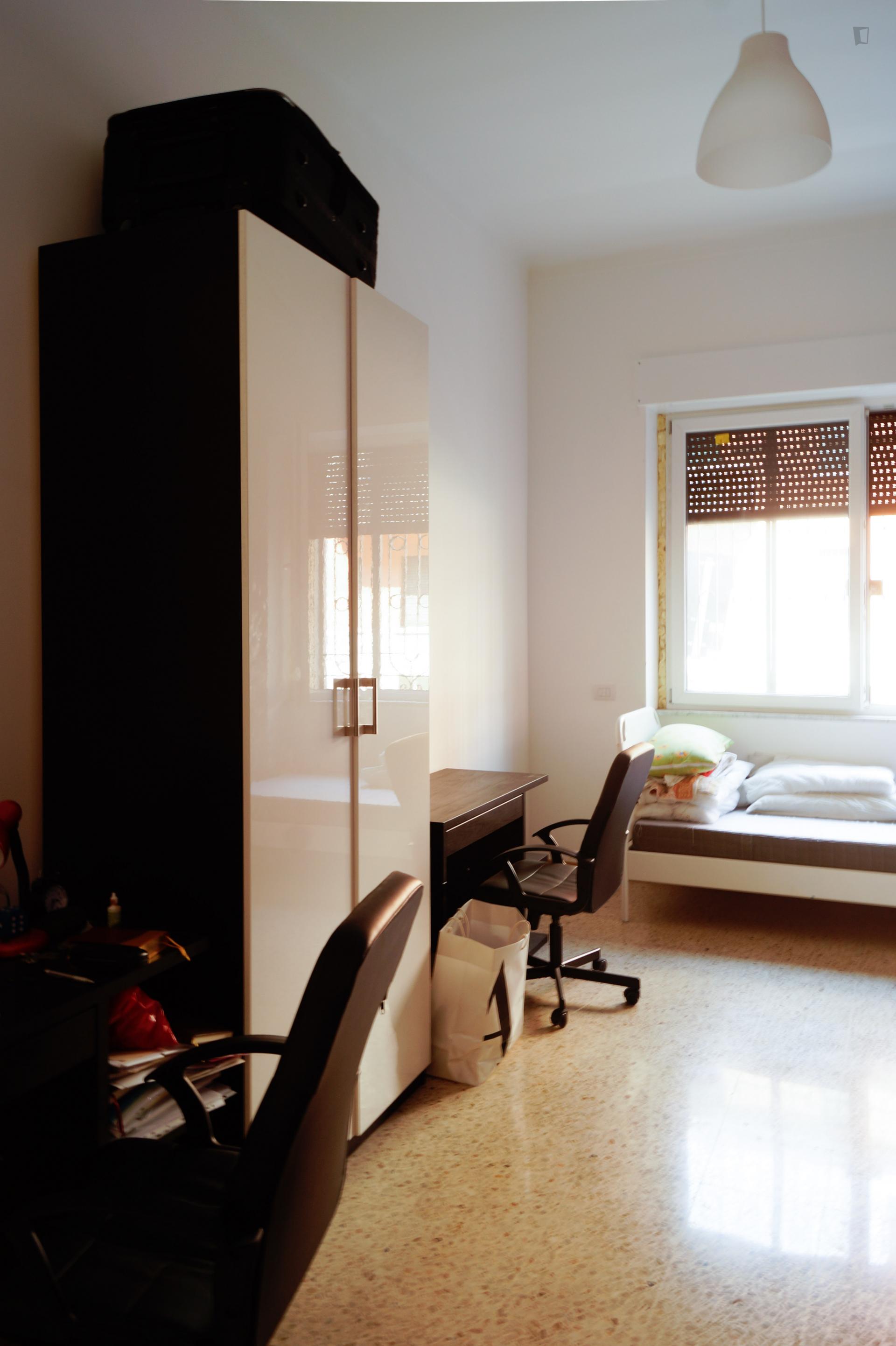 Bed in a twin bedroom, close to Politecnico