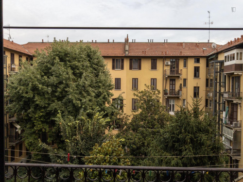 Bed in a twin bedroom in Porta Romana neighbourhood