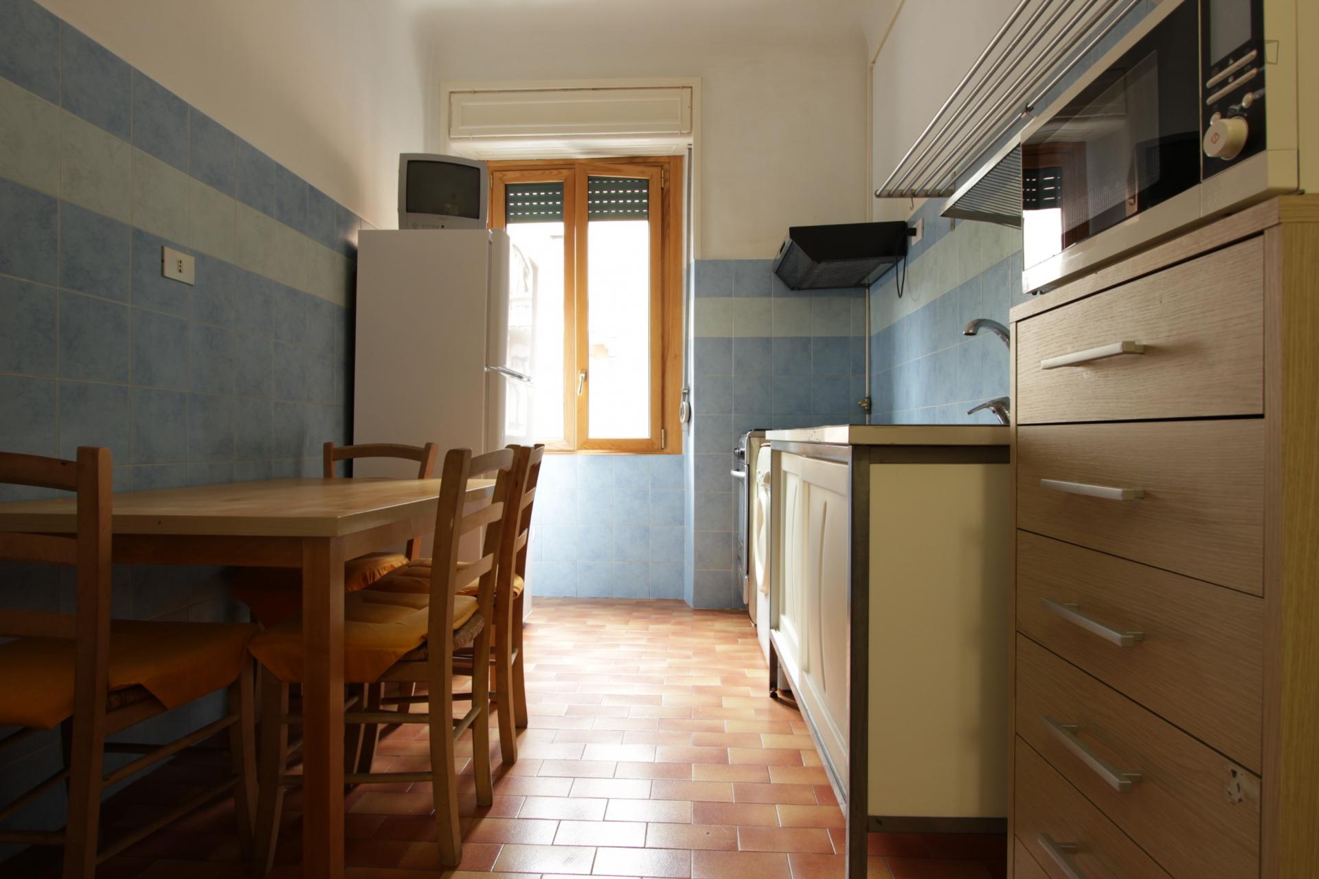 Bed in a twin bedroom in Città Studi