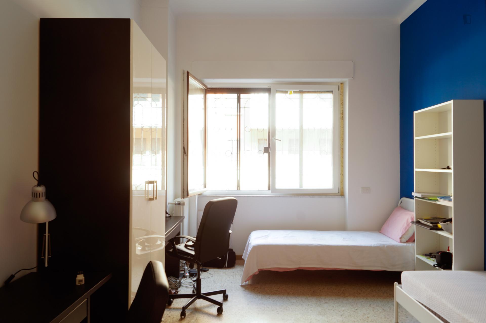 Bed in a twin bedroom, part of a 4-bedroom flat near the Colombo campus of Politecnico di Milano