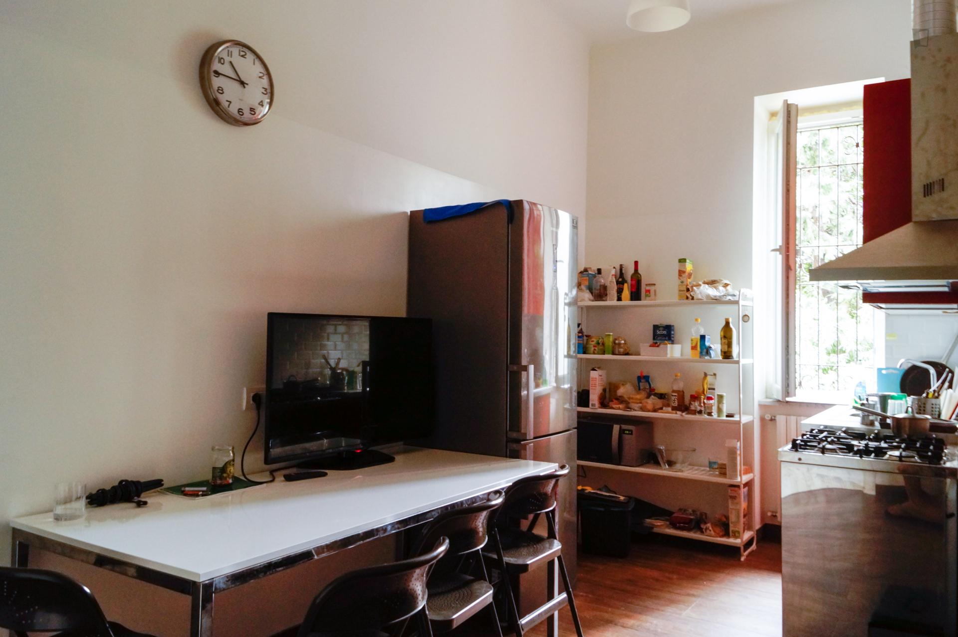 Bed in a twin bedroom, part of a 4-bedroom flat near the Colombo campus of Politecnico di Milano