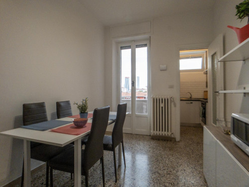 Bed in a twin bedroom connected with Cattolica University