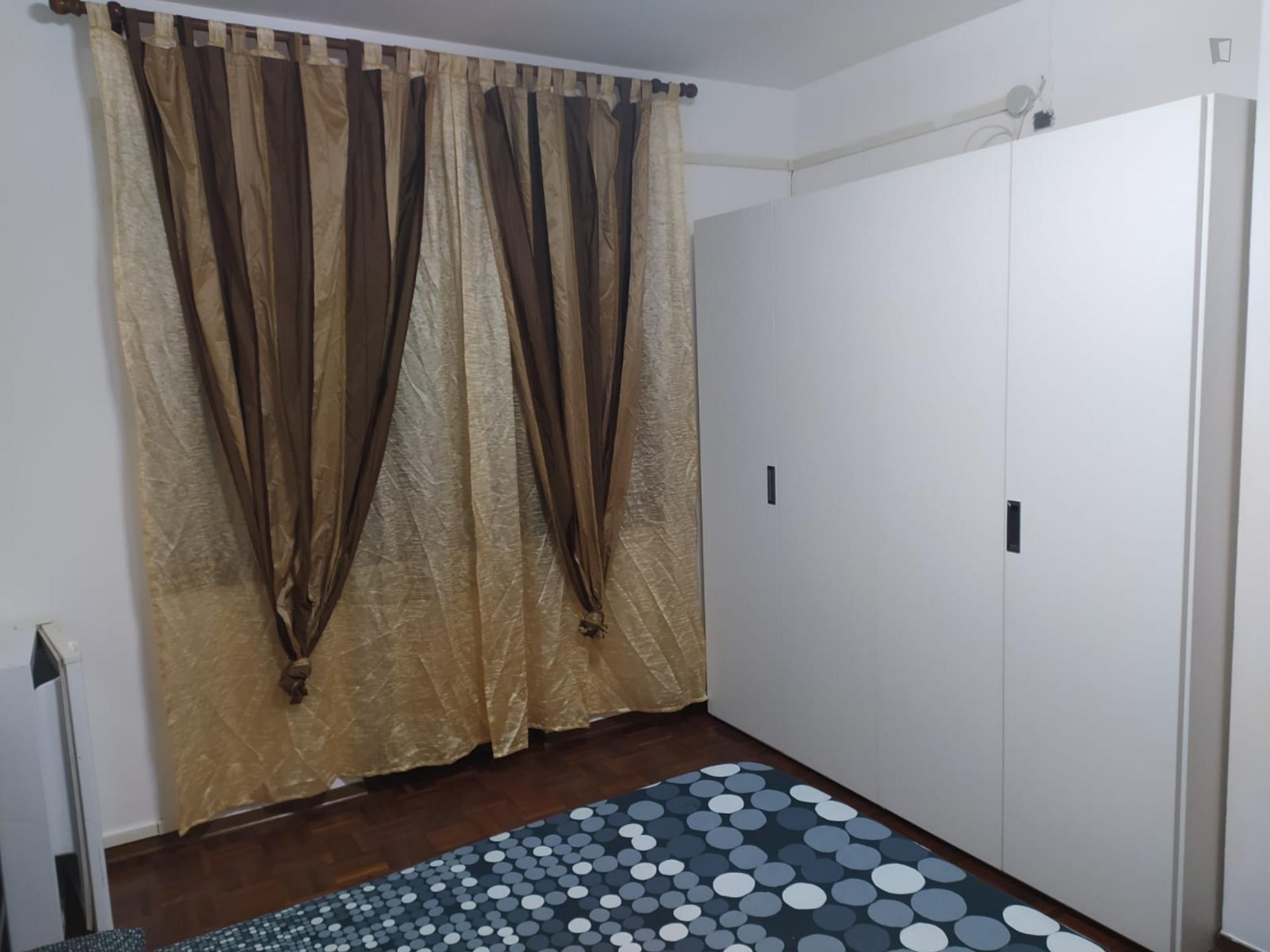 Bedroom in a shared apartment in a quiet area near Bologna