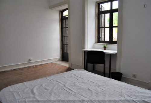Sunny double bedroom with an outdoor patio