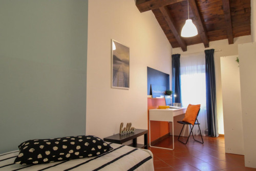 Colourful single bedroom in Università Cattolica del Sacro Cuore